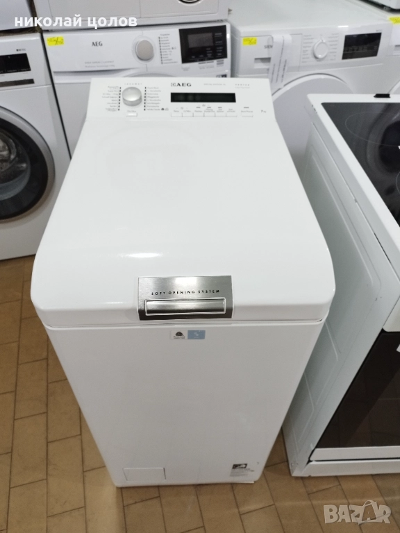 Пералня с горно зареждане AEG Protex , снимка 1