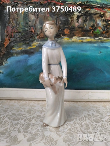 порцеланова фигурка на момиче с кученце