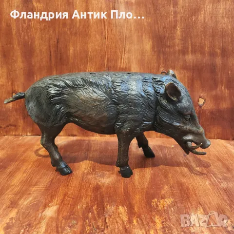 Бронзова скулптура на див глиган