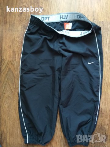 Nike Taffeta - страхотно дамско долнище, снимка 3 - Спортни екипи - 33280465
