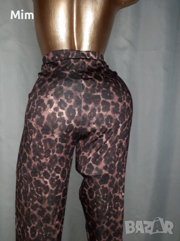 Janina 46/48 Еластичен клин анимал принт за едра дама , снимка 2 - Клинове - 38496396