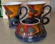 Продавам комплект от 2 ръчно рисувани керамични чаши плюс захарница с капак от Danko Pottery