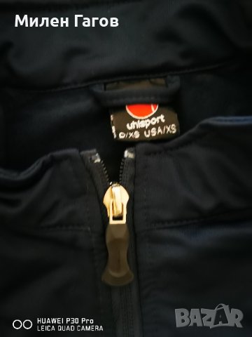 Детски анцуг на фирмата Uhlsport, размер XS, чосто нив, но без етикет. , снимка 2 - Детски анцузи и суичери - 43449544