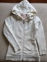 Нова бяла жилетка 10г, снимка 1 - Детски пуловери и жилетки - 32541120