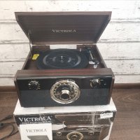 Продавам грамофон /радио/Bluetooth с говорители чисто нов Victrola 4 в 1, снимка 1 - Аудиосистеми - 37437062