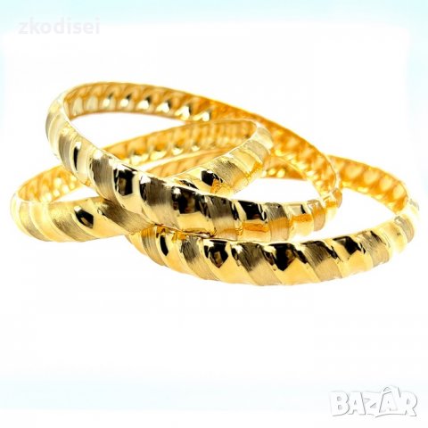 Нова златна гривна 6,88гр. диаметър:7,5см. ширина:1,0см. 14кр. проба:585 модел: 220-3