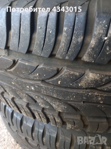 4 броя гуми с гуми , снимка 7 - Гуми и джанти - 52110642