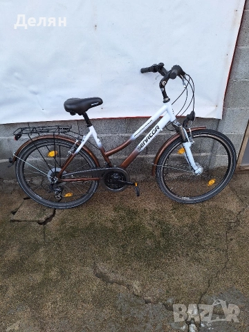 Велосипед SENATOR 26",алуминиева рамка,преден амортисьор,скорост 3×7,монтаж SHIMANO,фар,стоп