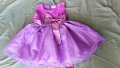 Виолетова рокля обличана само веднъж за снимки за първа година., снимка 1 - Бебешки рокли - 43265065
