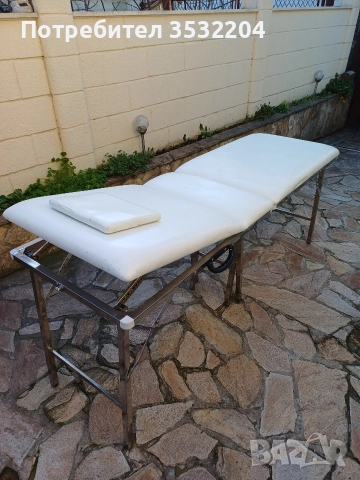 Масажна кушетка