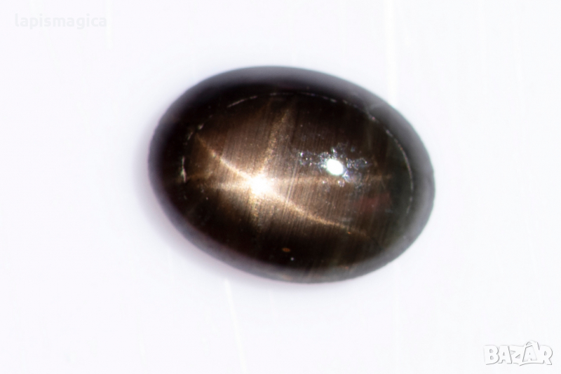 Черен звезден сапфир 0.68ct овал, снимка 1
