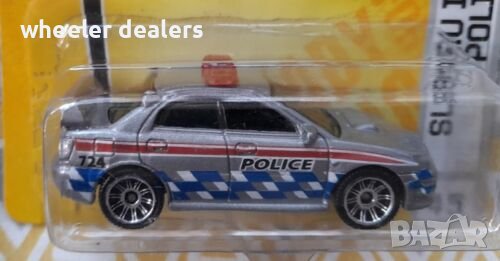 Метална количка Matchbox Subaru Impreza Police в мащаб 1:64, снимка 1