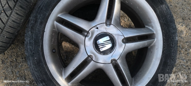 Оригинални джанти с гуми Seat 17 5x100 57,1, снимка 2 - Гуми и джанти - 51648132