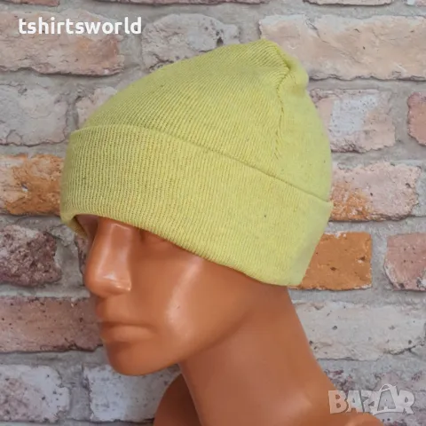 Нова зимна дамска/детска шапка в жълт цвят, снимка 2 - Шапки - 47663908
