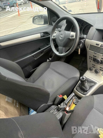 Опел Астра Х 2009 г , снимка 6 - Автомобили и джипове - 52478615