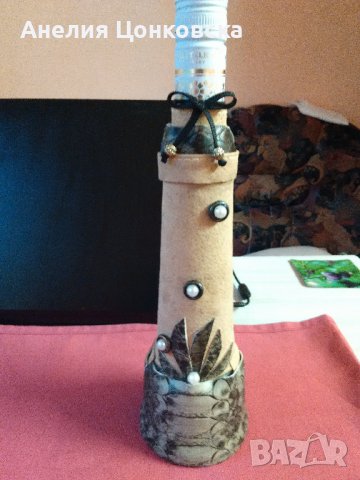 Голяма бутилка,ръчно декорирана с ест.кожа, снимка 1
