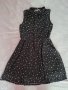 Черна рокля на черепчета H&M, снимка 1 - Детски рокли и поли - 40723278