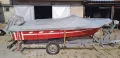 Лодка с двигател и колесар , снимка 1