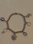 Сребърна гривна с пет талисманчета , снимка 1