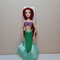Оригинална кукла Ариел "Малката русалка"
Дисни 
Нова, без кутия., снимка 3 - Кукли - 43718527