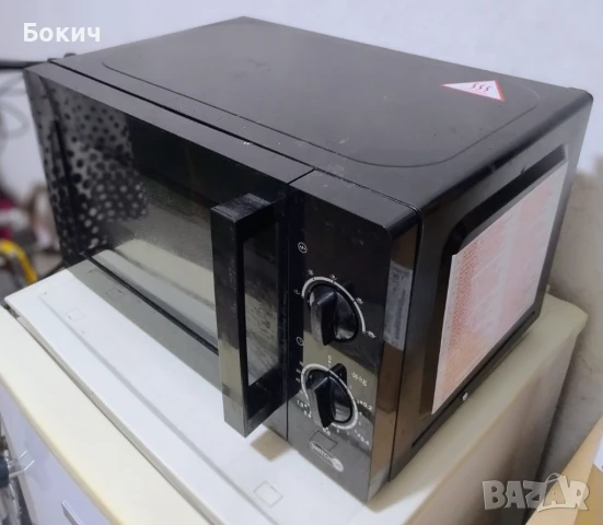Повредена микровълнова фурна SWITCH ON, 650 W, 17 л, за ремонт 