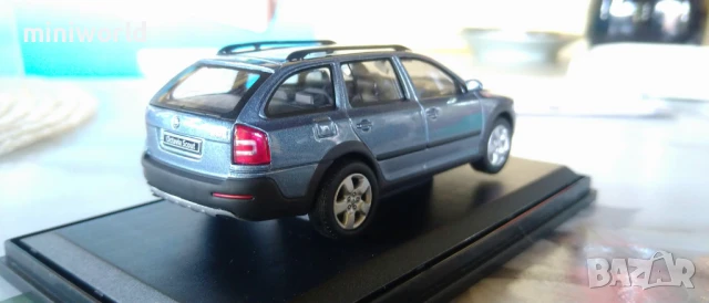 Skoda Octavia Combi Scout - мащаб 1:43 на Abrex моделът е нов в PVC дисплей-кейс, снимка 5 - Колекции - 50659735