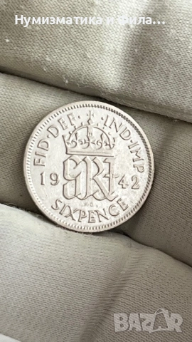 Сребърна монета  6 пенса 1942 година