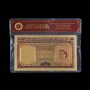 Малая Борнео 1953 - 100 позлатени долара полимер, снимка 1 - Нумизматика и бонистика - 26828434