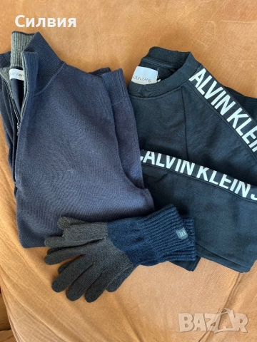 Дрехи на Calvin Klein - блузи и пуловери