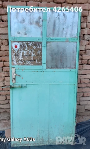 Входна врата за къща метална със стъкло