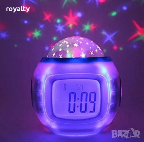 Будилник с прожекционна лампа – магията на звездното небе във вашата стая +музика