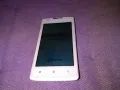 Lenovo A1000 8GB мобилен телефон със зарядно работещ, снимка 1