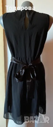 Много стилна рокля черна без ръкави, с волани с бял кант отпред., снимка 3 - Рокли - 48075432