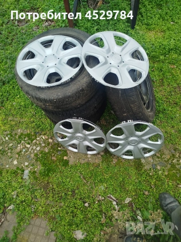 метални джанти за Форд с гуми и оригинални тасове, снимка 3 - Гуми и джанти - 53007607