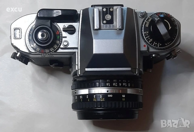 Фотоапарат Nikon FG с обектив Nikon Series E 50 F1.8, снимка 2 - Фотоапарати - 53423172