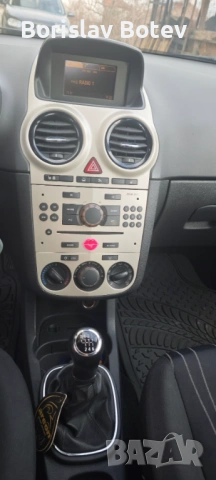 Opel Corsa D 1.3cdti, снимка 13 - Автомобили и джипове - 53601509