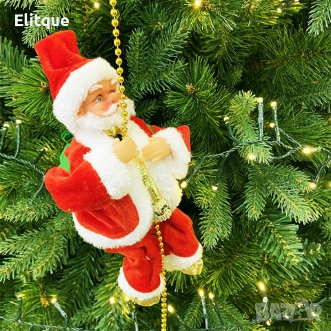 Катерещ се по мъниста Дядо Коледа. Височина на Дядо Коледа 13 см