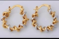 Интересни навити обеци от 9к бяло и жълто попълнено злато 15 лв., снимка 1
