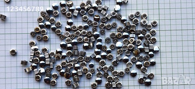 Хромирани ( бели) коронки за часовници 100 гр, около 215 бр