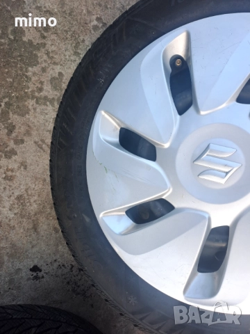 Продавам 4бр. стоманени джанти с  зимни гуми и оригинални тасоне сузики 4×100 централен отвор 51.4, снимка 4 - Гуми и джанти - 52614480