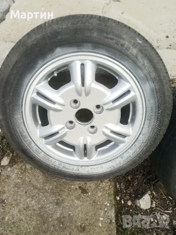 Лети джанти 15 цола 5,5 J с 4 -ри дупки и 114,3 ММ. разстояние между дупките, снимка 1