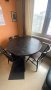 Черна дървена разтегателна трапезна маса (110-150 см) и 4 стола, снимка 1 - Маси - 43435899