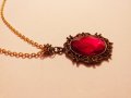 Прелестно колие и медальон с рубинено червен кристал кабошон в цвят антично Злато., снимка 3