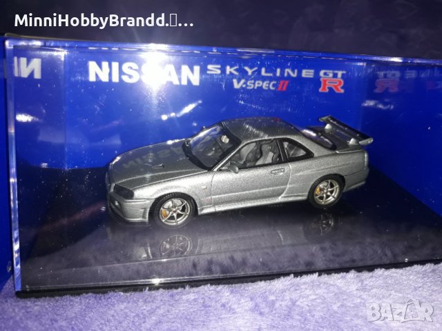 NISSAN  SKYLINE GT-R R 34 V spec AUTOart 1.43  Top Model , снимка 2 - Колекции - 39258739