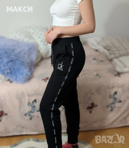 Чудесно еластично долнище с ластична талия и кор.вързалки+странични джобове Calvin Klein в черно /ау, снимка 2 - Спортни екипи - 53076852