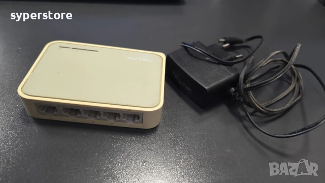 Суич TP-Link TL-SF1005D 5 порта Switch 100Mbps, втора употреба с нормални следи от употреба, комутат, снимка 2 - Суичове - 50642690