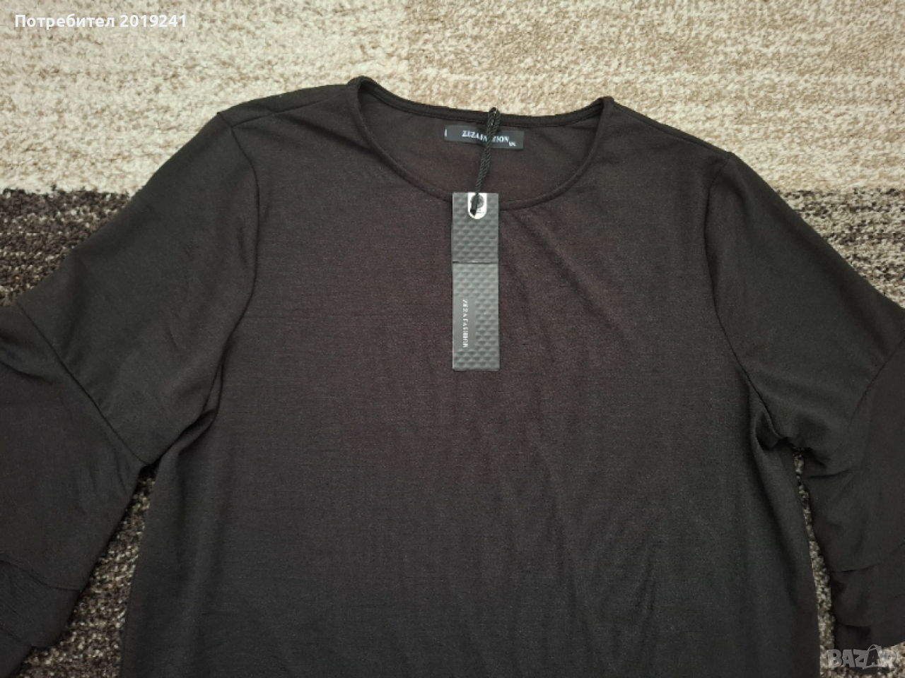 Черна нова рокля с ефектен ръкав , снимка 1