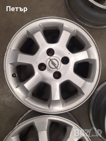 ОРИГИНАЛНИ ЖЕЛЯЗНИ ДЖАНТИ-ОПЕЛ -4Х100Х56.6-15 ЦОЛА, снимка 2 - Гуми и джанти - 52839523