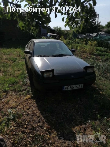 МАЗДА323F