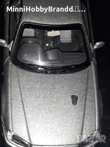 NISSAN  SKYLINE GT-R R 34 V spec AUTOart 1.43  Top Model , снимка 14 - Колекции - 39258739